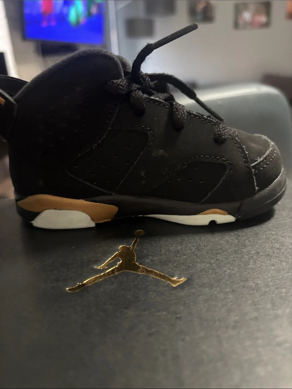 Jordan Kids Black and Gold High-Top Sneakers